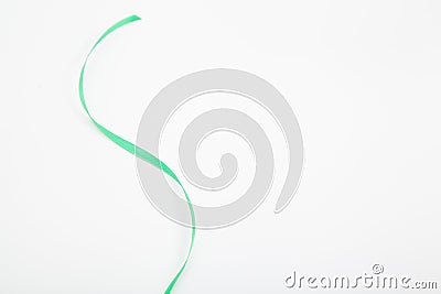 Green wavy ribbon on white Stock Photo