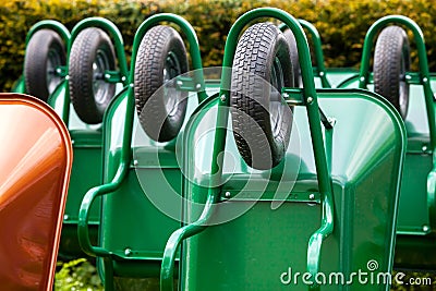 Green wheelbarrows Stock Photo