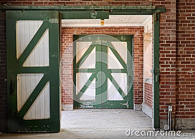 Green and white horse stable doors Stock Photo