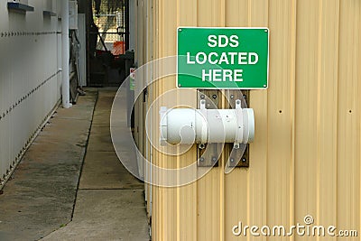 Green and white SDS Located Here sign Stock Photo