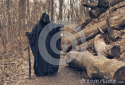 The green witch in the autumn forest Stock Photo