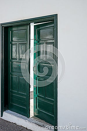 Green wooden open door Stock Photo