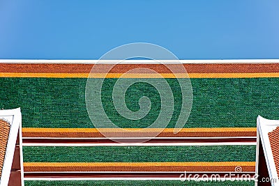 green, yellow and orange classic baked clay roof pattern. Stock Photo