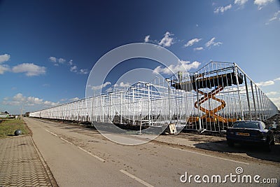 Greenhouse construction in progress in Moerkapelle where a rose nursery is builded. Editorial Stock Photo