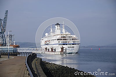 Greenock, Scotland, UK, March 24th 2021, World Odyssey passenger ship during cruise with tourists travelling stopping at Editorial Stock Photo