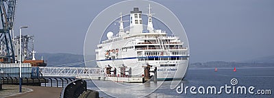 Greenock, Scotland, UK, March 24th 2021, World Odyssey passenger ship during cruise with tourists travelling stopping at Editorial Stock Photo