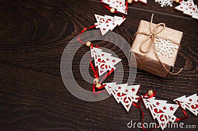 Greeting card for Christmas with wooden toy of trees and gift box Stock Photo