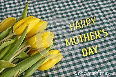 Greeting card Happy Mother`s Day. With the inscription Happy Mother`s Day. Bright yellow tulips Stock Photo