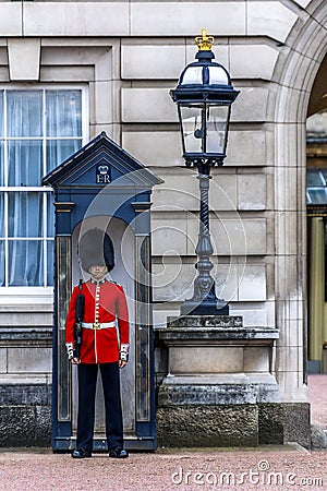 Grenadier Guard at Buckingham Palace. London, England. Editorial Stock Photo