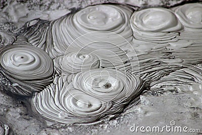 Grey bubbling mud Stock Photo