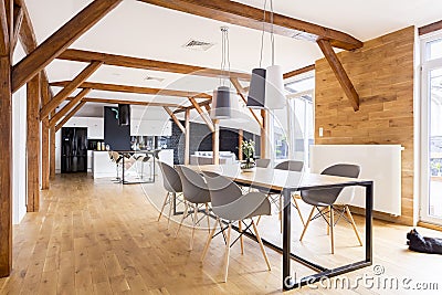 Spacious wooden dining room Stock Photo