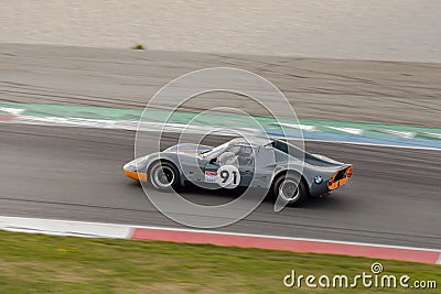 Grey classic car at the TT Circuit Assen circuit Editorial Stock Photo