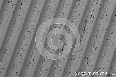 grey concrete wall with deep textured 3d lines diagonal Stock Photo