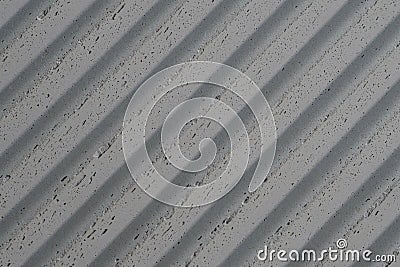 grey concrete wall with deep textured 3d lines diagonal Stock Photo