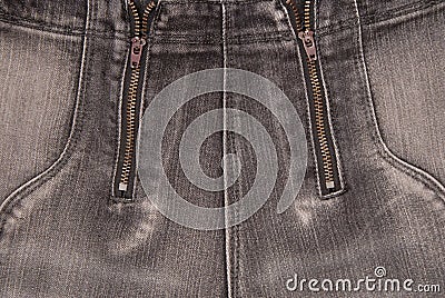 Grey denim backgrounds, close up of jeans, fashionable trousers Stock Photo