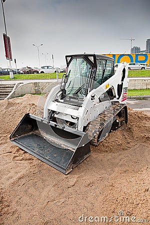 Grey diesel front end loader Editorial Stock Photo