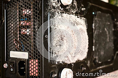 Grey dust on the computer pc processor cooler with mainboard and computer case fragment Stock Photo