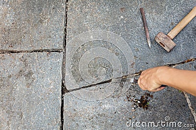 Grey flagstones with stone mason tools Stock Photo