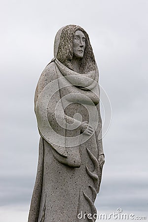 Grey granit statue of Ninnog Editorial Stock Photo