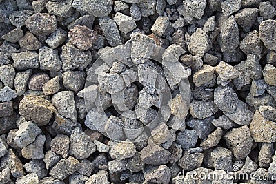 Grey gravel closeup photo for background. Sharp gray stones in pile for construction. Stock Photo
