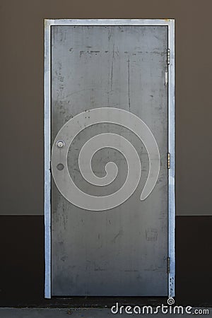 Grey Industrial Exterior Door Stock Photo