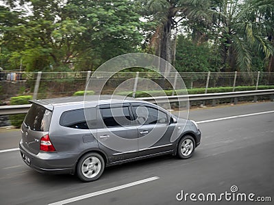 Grey minivan Stock Photo