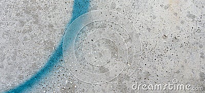 Grey old grunge concrete cement wall with painted drawing light blue graffiti line element. Urban street art rough Stock Photo