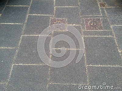 Grey paving slabs out of concrete with bright Stock Photo