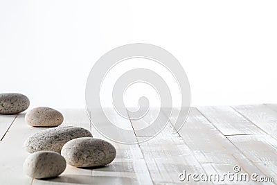 Grey pebbles for meditation, mindfulness, mineral spa or white emptiness Stock Photo