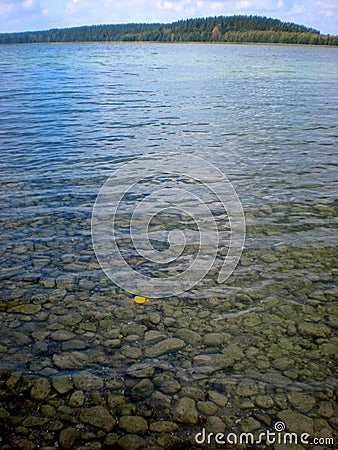 Grey pebbles under clear water of Wigry Lake Stock Photo