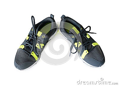 Grey sneakers with neon green inserts Stock Photo