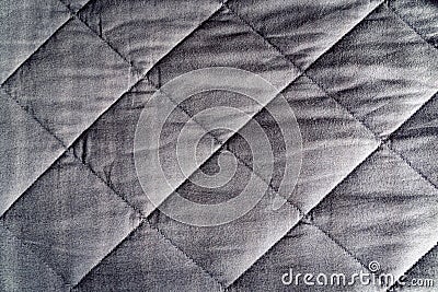Grey weighted blanket texture detail, heavy relaxing bed sheet Stock Photo