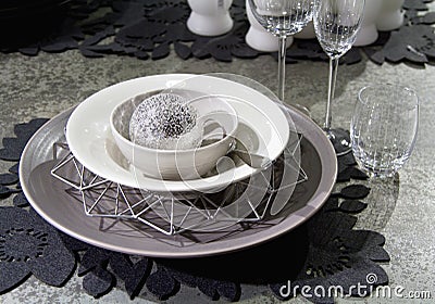 Grey and white festive table apointments with decorations Stock Photo