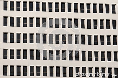 A frame of a many windows of high building in the city Stock Photo