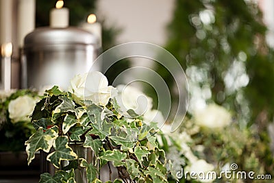 Grief - urn Funeral and cemetery Stock Photo