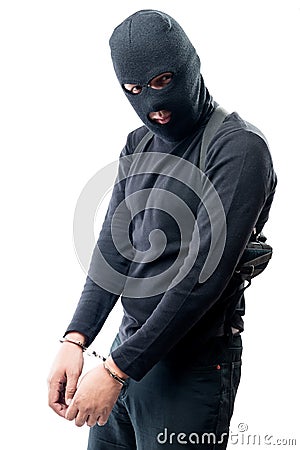 Grieved criminal in handcuffs arrested, portrait Stock Photo