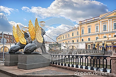 Griffins with golden wings on the Bank Bridge in St. Petersburg Editorial Stock Photo