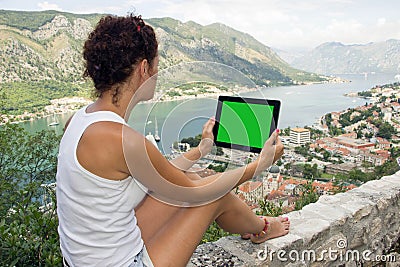Gril with tablet computer with green screen Stock Photo