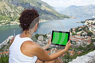 Gril with tablet computer with green screen Stock Photo
