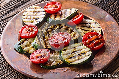 Griledl seasonal vegetable tomatoes and zucchini. Grill food Stock Photo