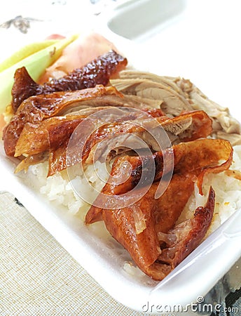 Grill duck topping on steam rice Stock Photo