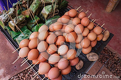 Grill eggs at market, Street food at thailand Stock Photo
