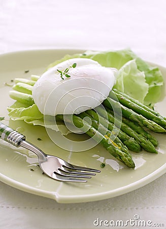 Grilled asparagus with poached egg Stock Photo