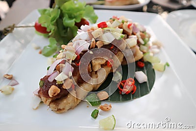 Grilled bass , grilled fish with spicy dressing Stock Photo