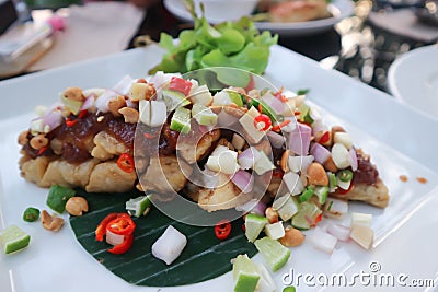 Grilled bass, grilled fish with spicy dressing Stock Photo