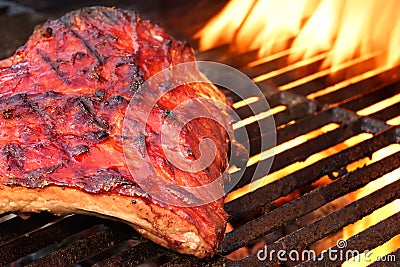 Grilled BBQ Tasty Smoked Marinated Pork Ribs At Summer Party Stock Photo