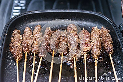 Grilled beef skewers or sate or satay on a pan Stock Photo