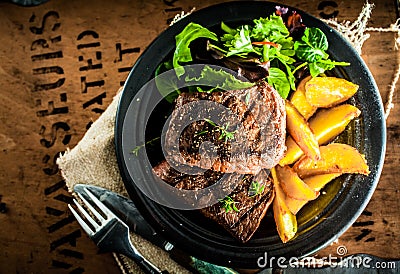 Grilled beef steak with roasted pumpkin Stock Photo