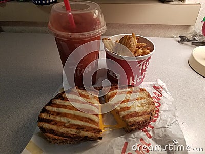 Grilled Cheese Melt with a Side and a Drink Editorial Stock Photo