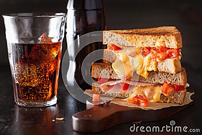 Grilled cheese sandwich with ham and tomato Editorial Stock Photo